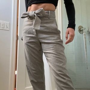 Aritzia gray tied open ankle pants.